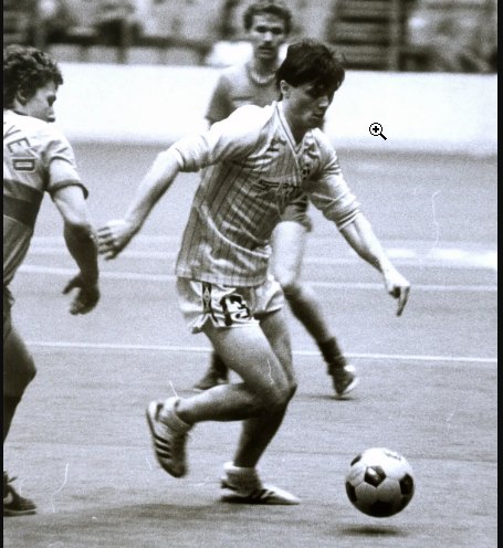 Spirit forward driving at goal, black and white