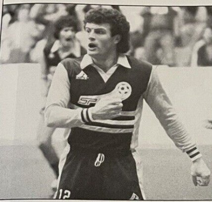 Spirit player celebrating, black and white
