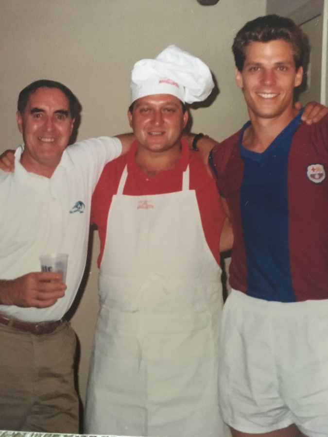 Peter Smith, John Kowalski, and Kittelberger together, one of them in a chef's hat and apron